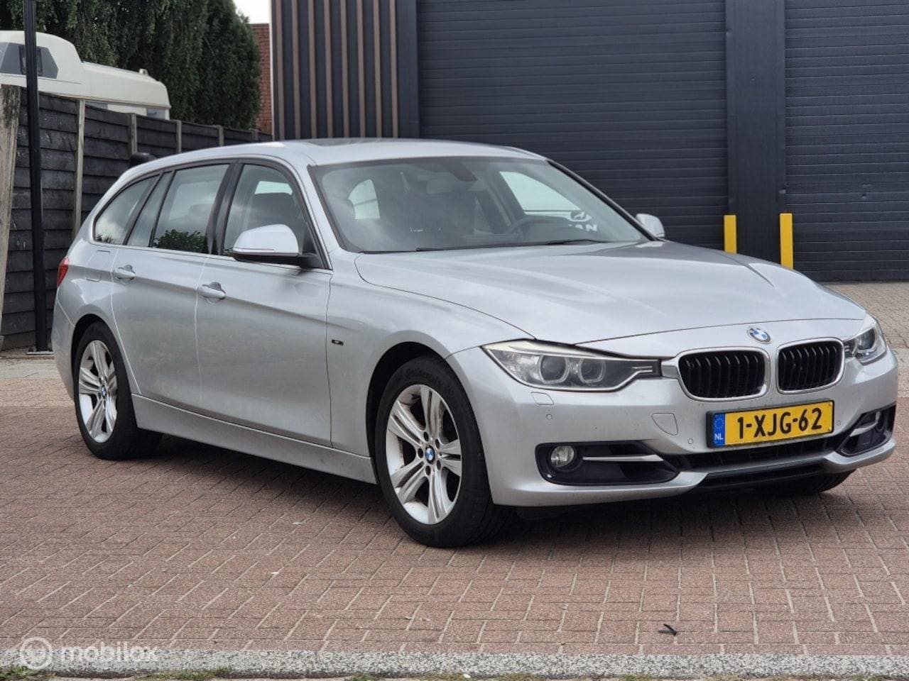 BMW 3-serie Touring - 320i High Executive 320i High Executive - AutoWereld.nl