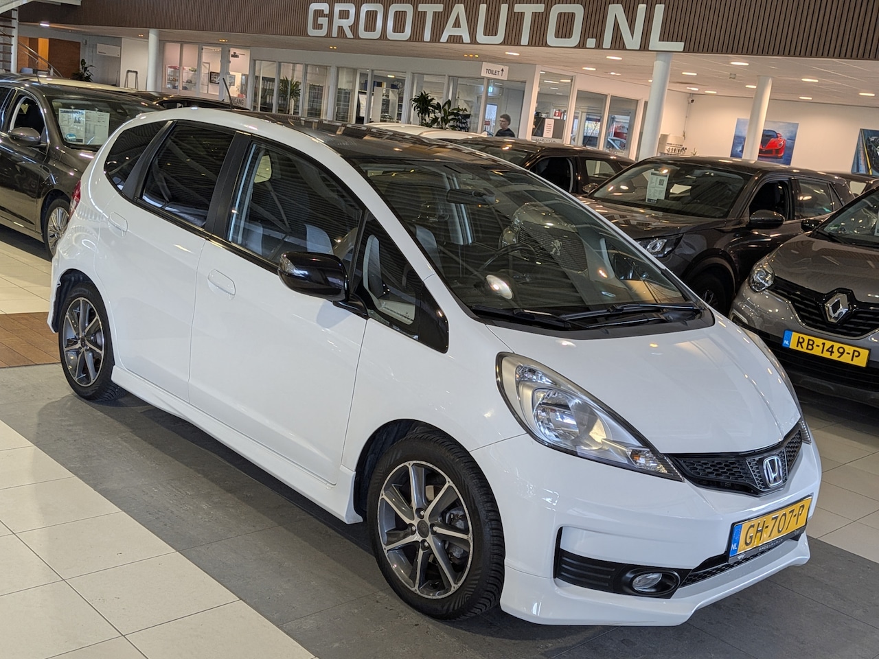 Honda Jazz - 1.4 Elegance Airco, Cruise Control, Stuurbekrachtiging - AutoWereld.nl