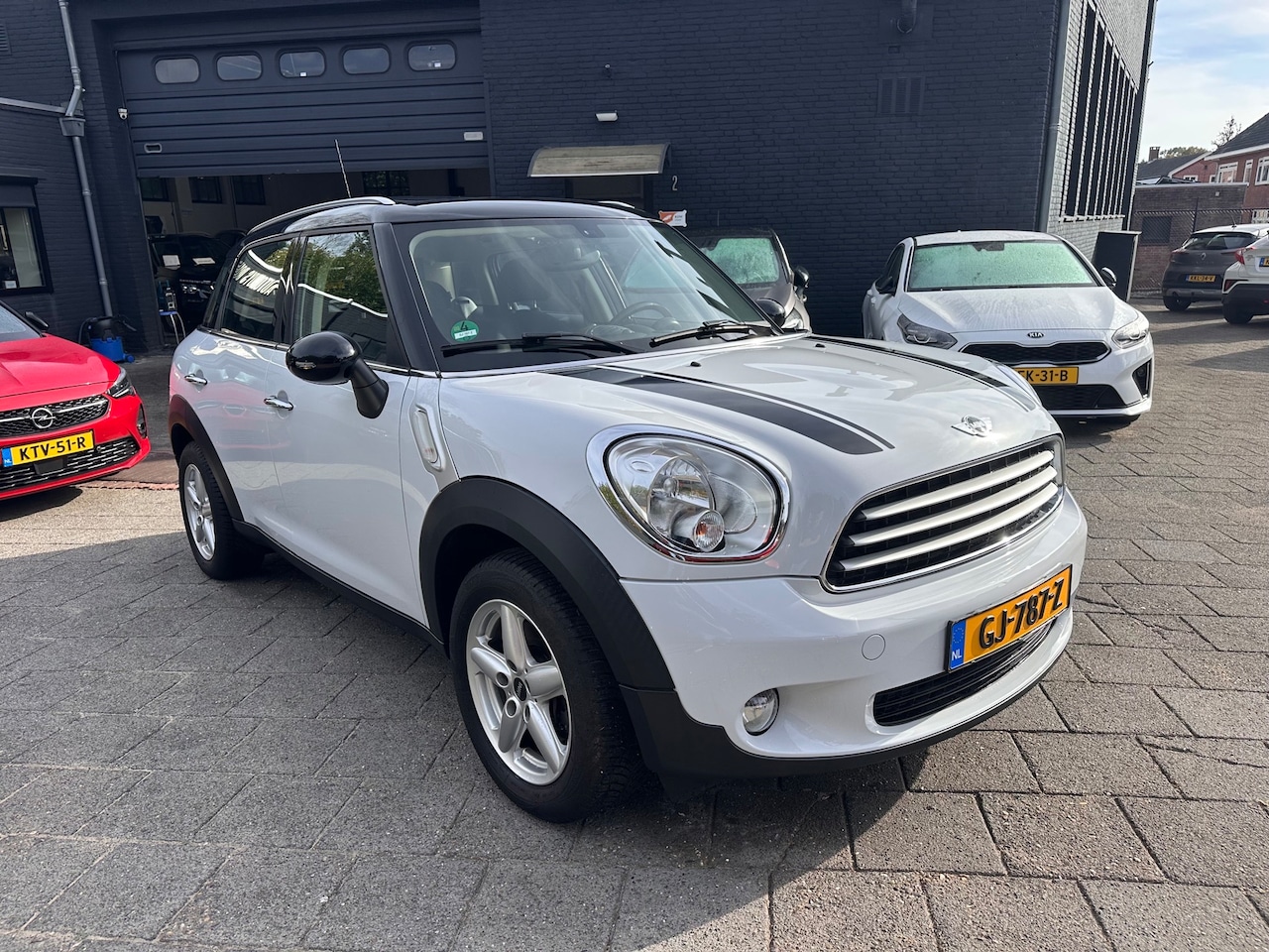 MINI Countryman - 1.6 Cooper 122pk|Afn. Trkhk|Panodak|All Season - AutoWereld.nl