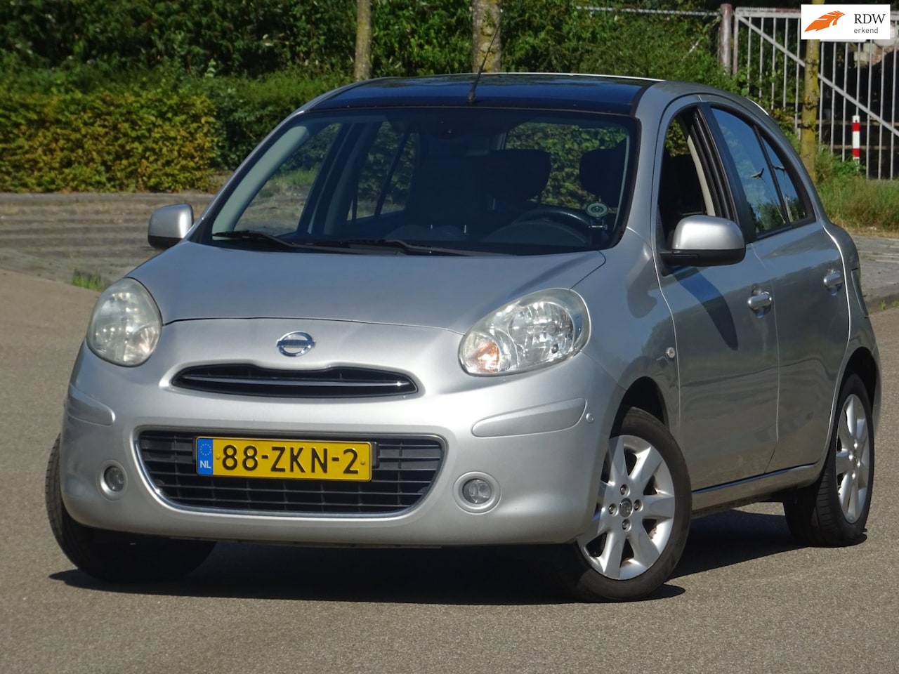 Nissan Micra - 1.2 DIG-S Tekna NAP/NAVI/CLIMA/CRUISE/PDC/DAK - AutoWereld.nl