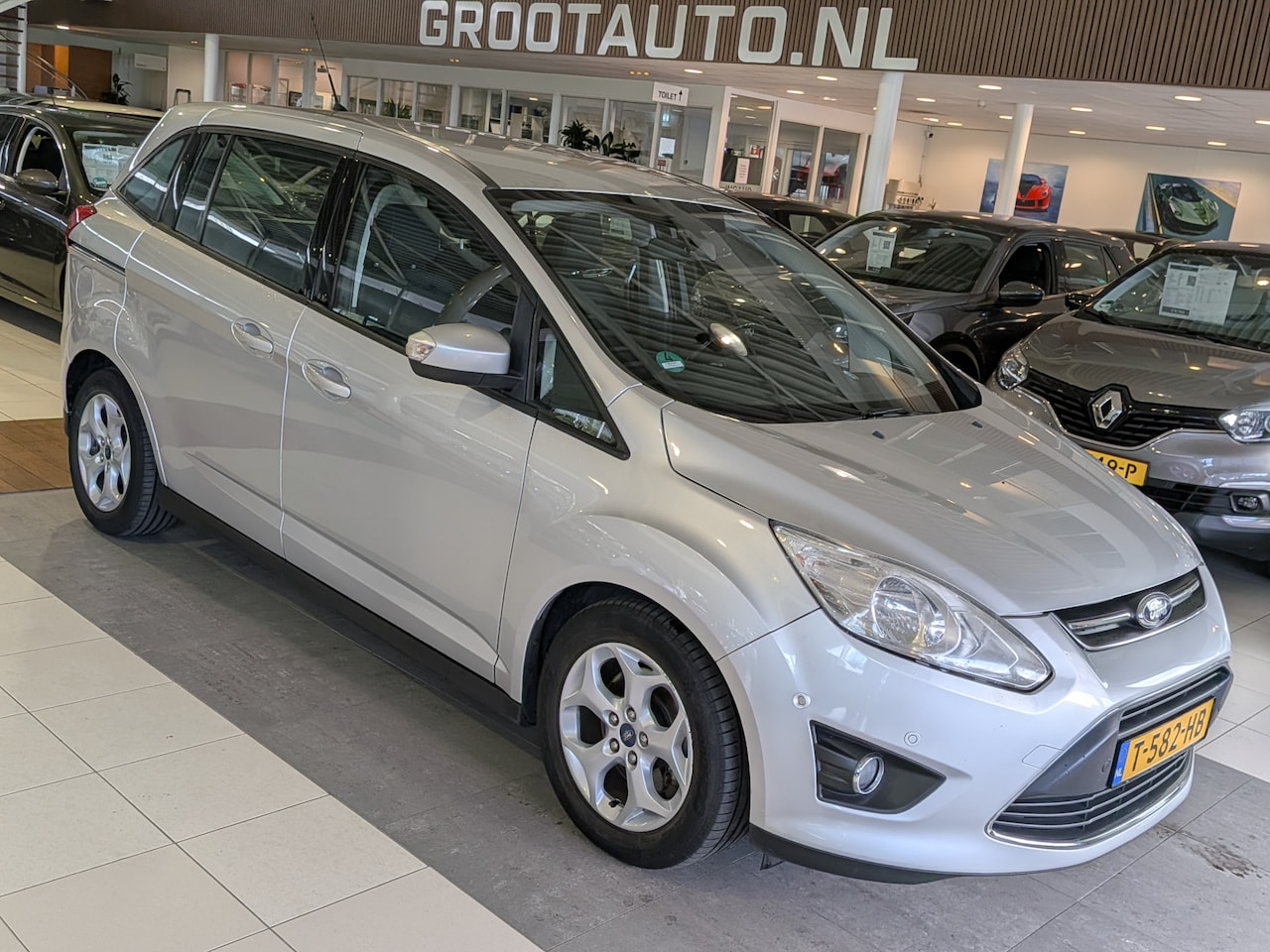 Ford Grand C-Max - 1.0 Ambiente Airco, Cruise Control, Trekhaak, Stuurbekrachtiging - AutoWereld.nl