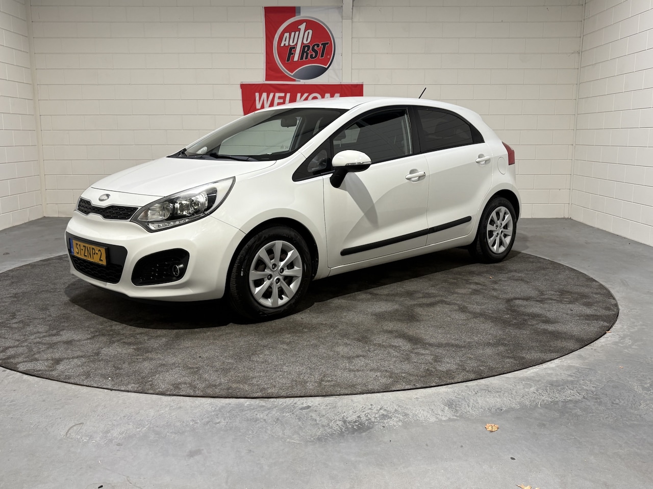 Kia Rio - 1.2 CVVT Design Edition 1.2 CVVT Design Edition, Airco, Cruise, P sensoren, Prijs incl. nieuwe Apk, beurt en 3 maa - AutoWereld.nl