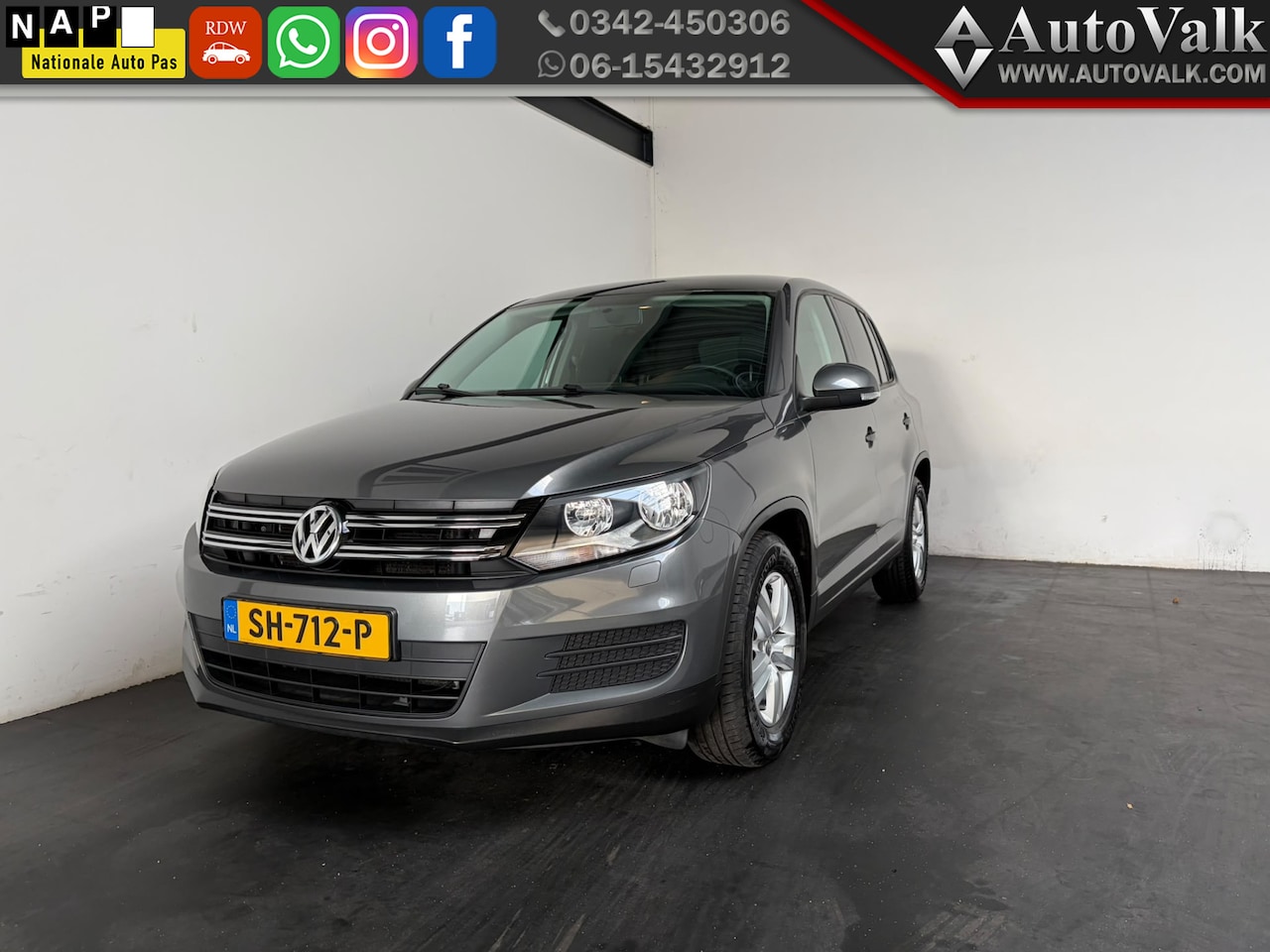 Volkswagen Tiguan - 1.4 TSI Sport&Style. Navi. Stoelverwarming! - AutoWereld.nl