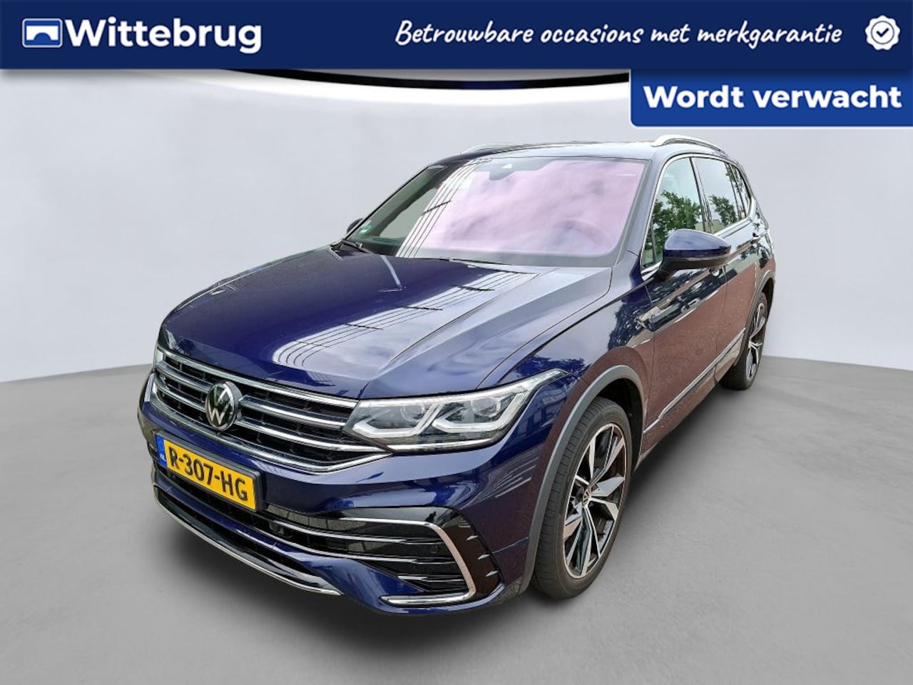 Volkswagen Tiguan Allspace - 1.5 TSI 150pk R-Line Business+ 7persoons / Panoramadak / Camera / R-Line / Wegklapbare tre - AutoWereld.nl