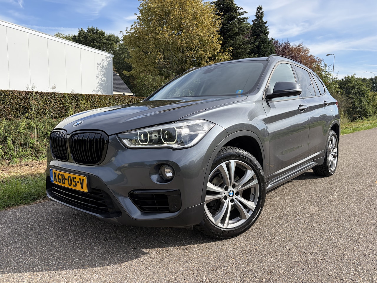 BMW X1 - sDrive18i High Executive / AUTOMAAT / NAVI / CAMERA / TREKHAAK / LEER / 113dkm! - AutoWereld.nl