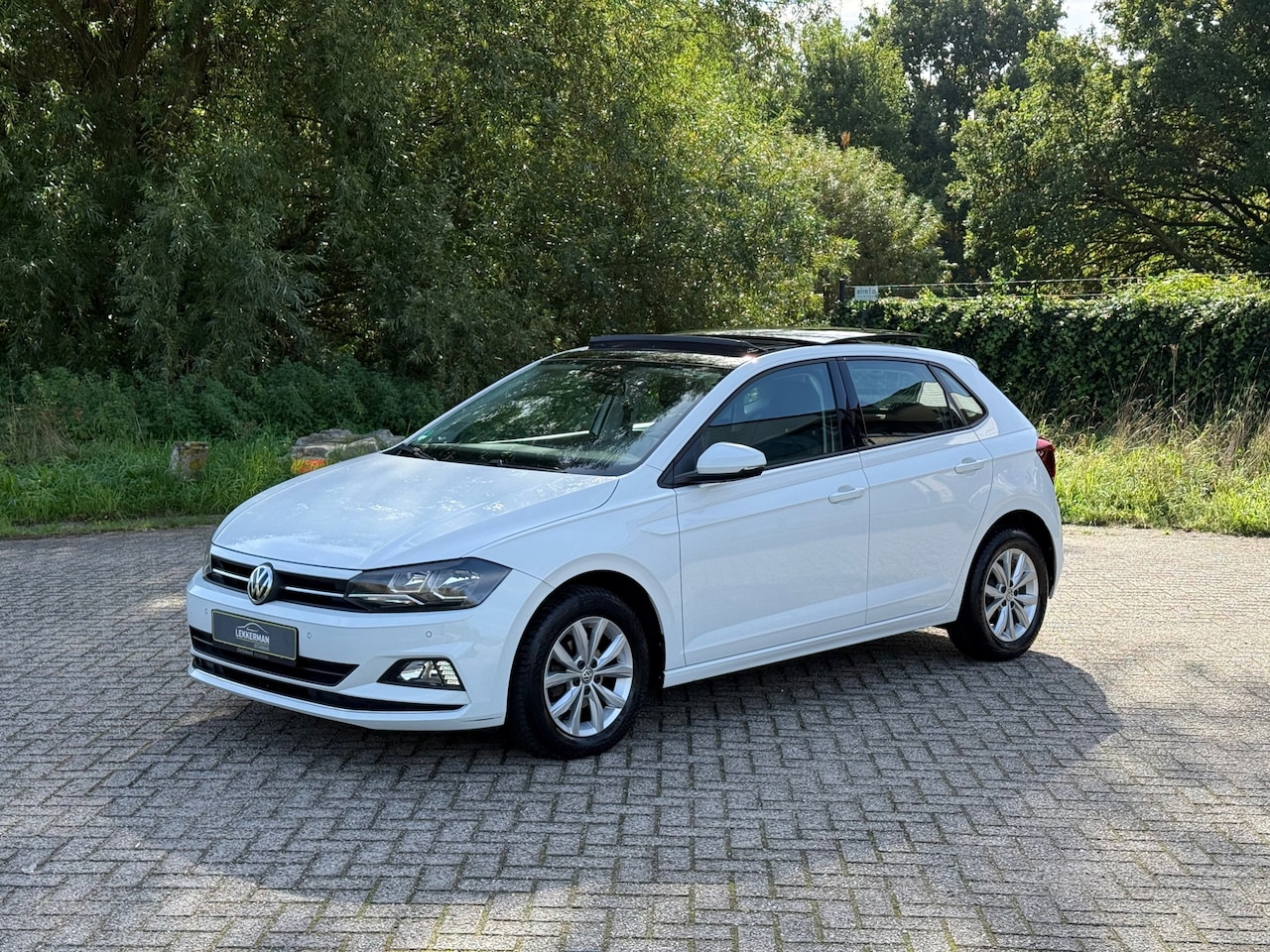 Volkswagen Polo - 1.0 TSI Highline PANO I 1E EIG I CAMERA I PDC I CARPLAY I ZEER MOOI - AutoWereld.nl