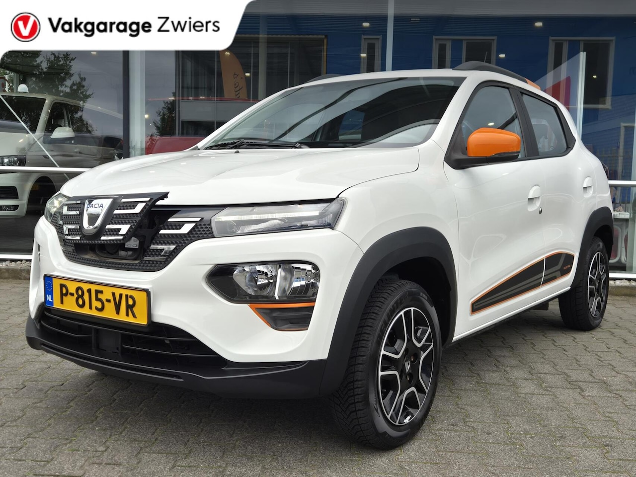 Dacia Spring - Business 27 kWh SOH91.8% Orange Pack | Camera | - AutoWereld.nl