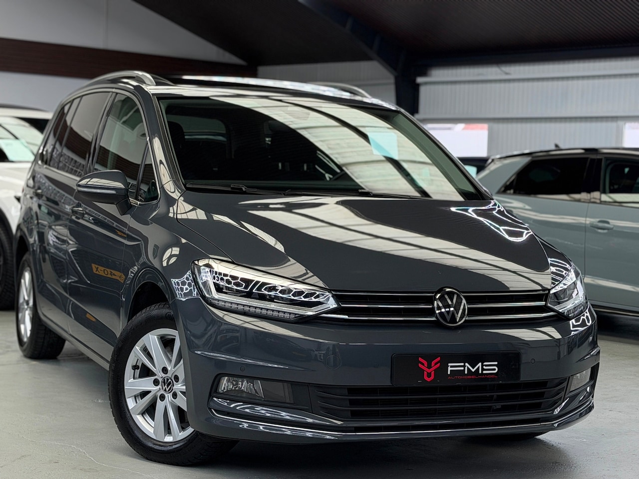 Volkswagen Touran - 1.5 TSI Highline 7p Carplay Panorama - AutoWereld.nl