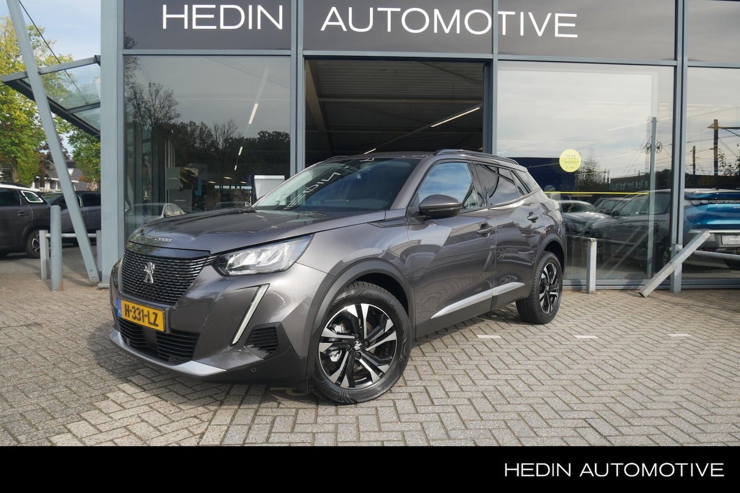 Peugeot 2008 - 1.2 Allure Trekhaak | All weather banden | Camera | Climate Control | PDC V+A | Cruise Con - AutoWereld.nl
