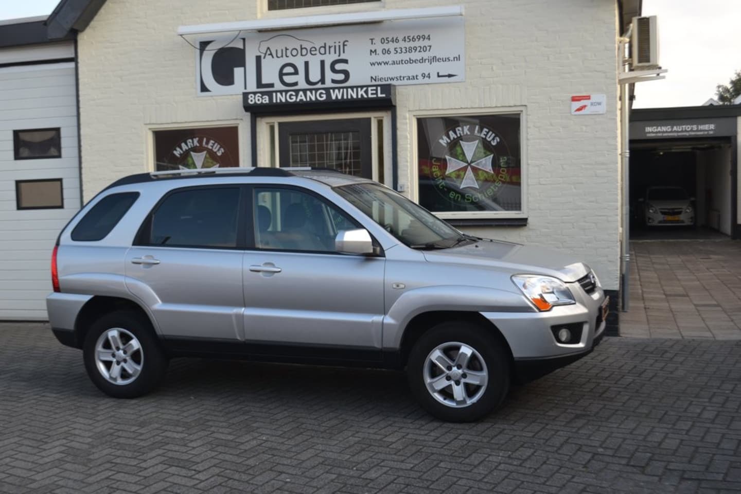 Kia Sportage - 2.0 CVVT X-ecutive Bijzonder Nette Auto 1e eigenaar - AutoWereld.nl