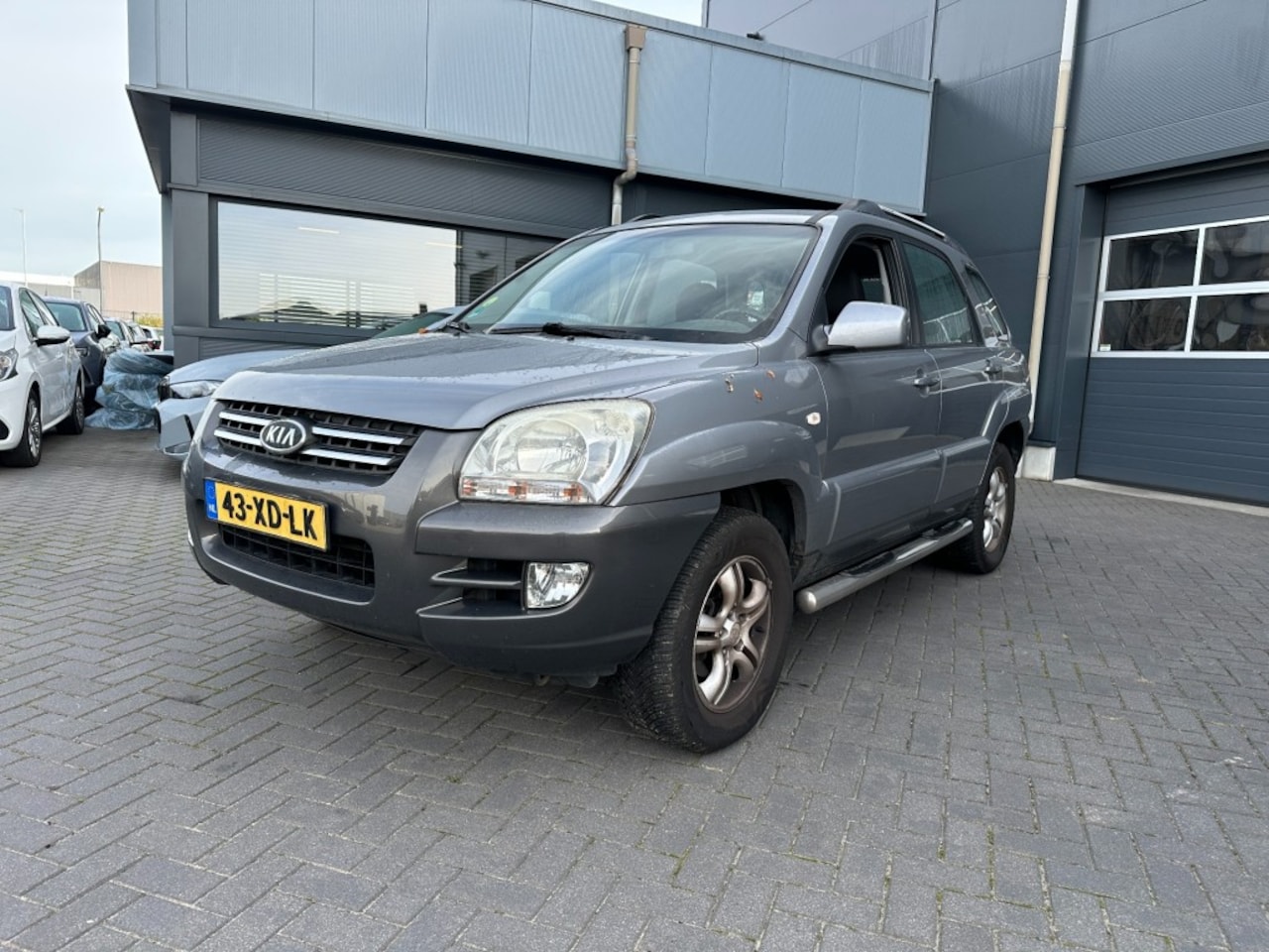 Kia Sportage - 2.0 CVVT Comfort Airco Trekhaak EXPORT - AutoWereld.nl