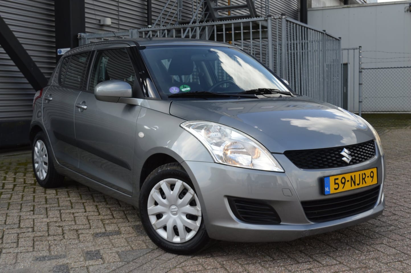 Suzuki Swift - 1.2 Bandit EASSS bj10 airco Navi leuke auto - AutoWereld.nl