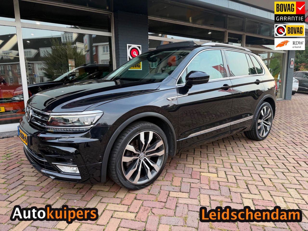 Volkswagen Tiguan - 2.0 TSI 4Motion Highline 2.0 TSI 4Motion Highline - AutoWereld.nl