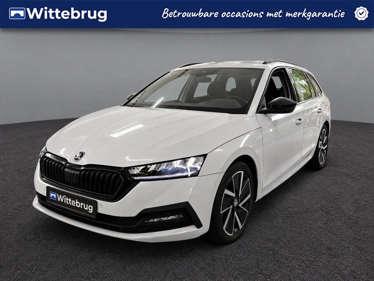 Skoda Octavia Combi - 1.0 TSI Sport Business / Trekhaak / Parkeersensoren voor en achter / Navi / Cruise Control - AutoWereld.nl