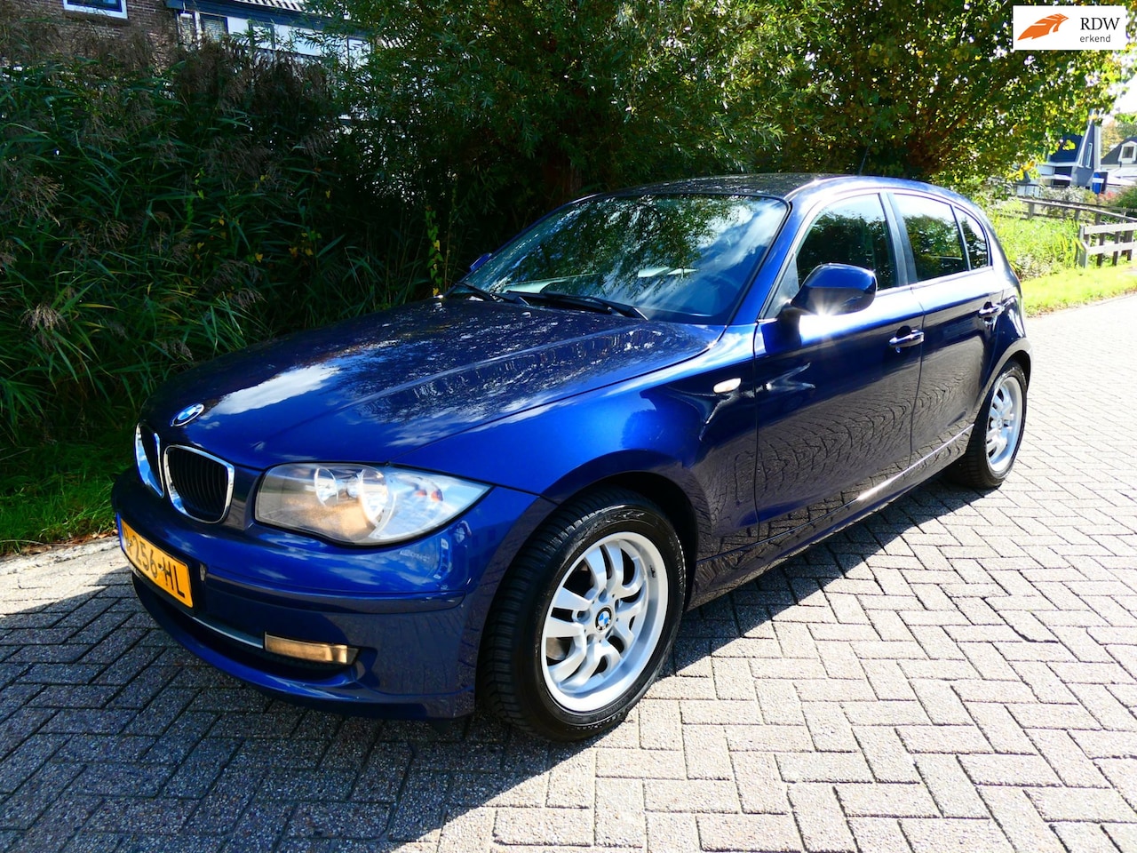 BMW 1-serie - 116i Automaat 5-deurs 122pk Clima Cruise Navi - AutoWereld.nl