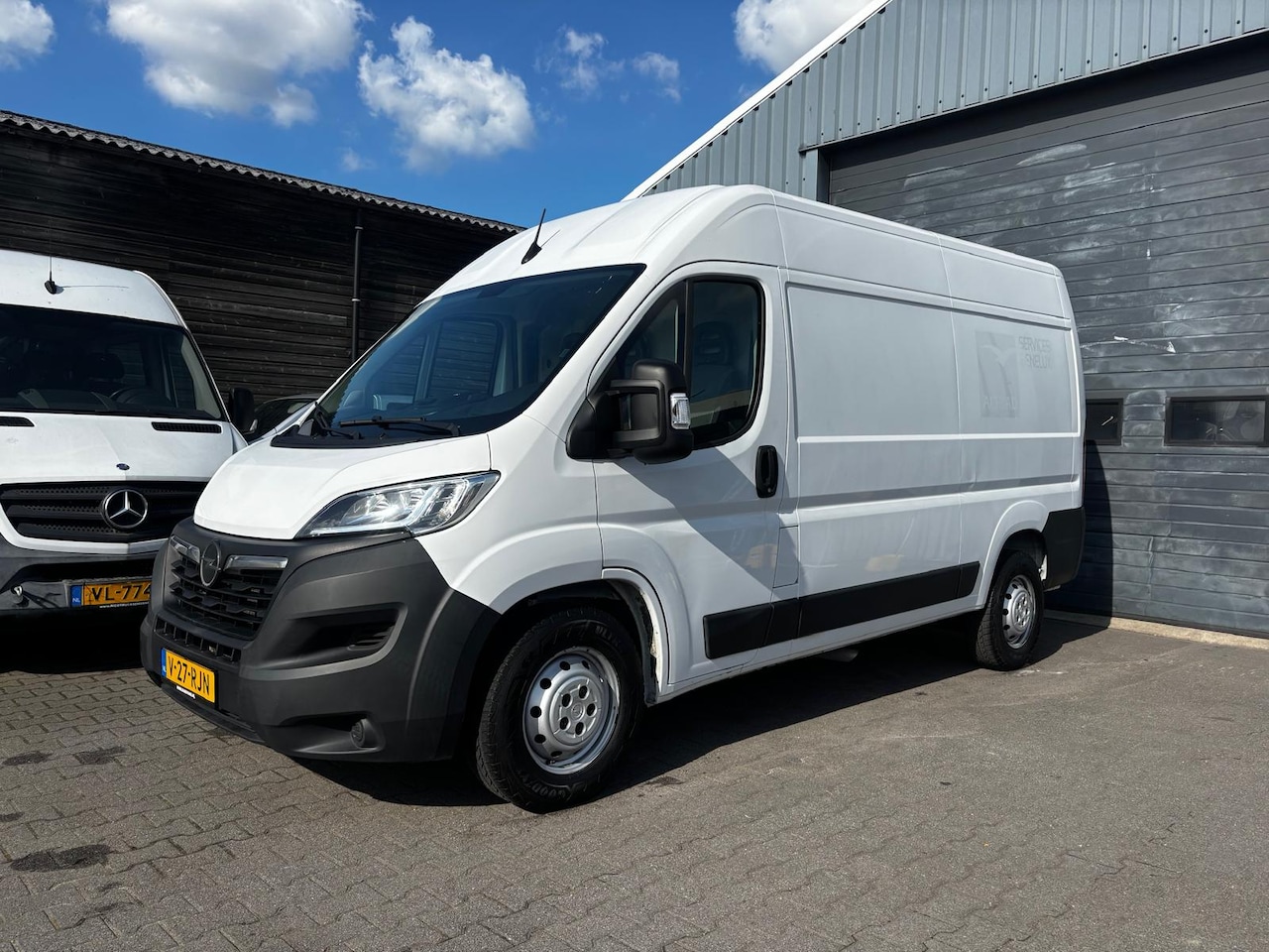 Opel Movano - 2.2 D L2H H2 Airco Navi Cruise crontrol AHK - AutoWereld.nl