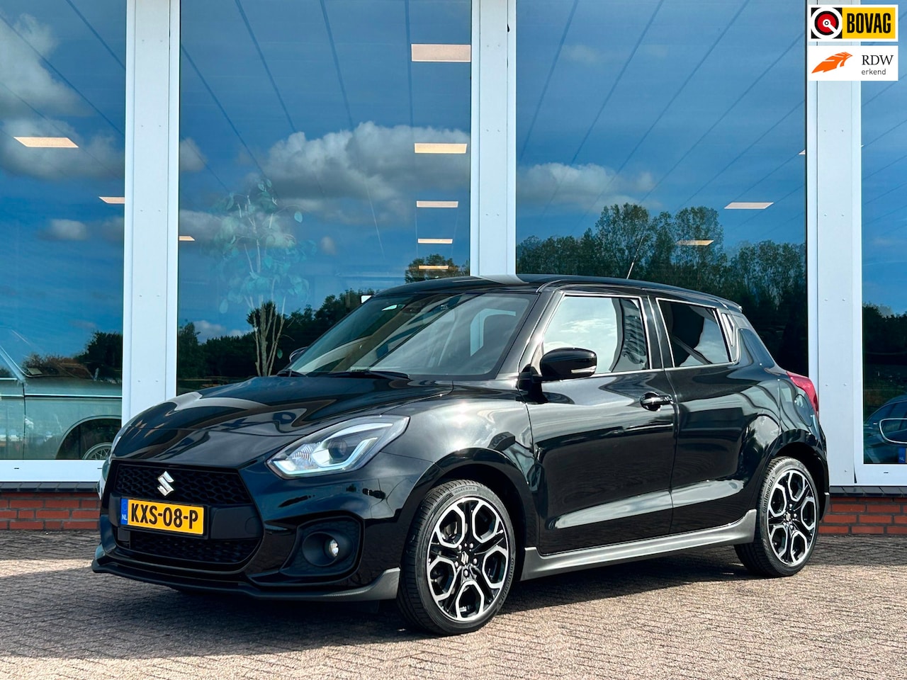 Suzuki Swift - 1.4 Sport Smart Hybrid - Navi - Camera - 17 inch - AutoWereld.nl