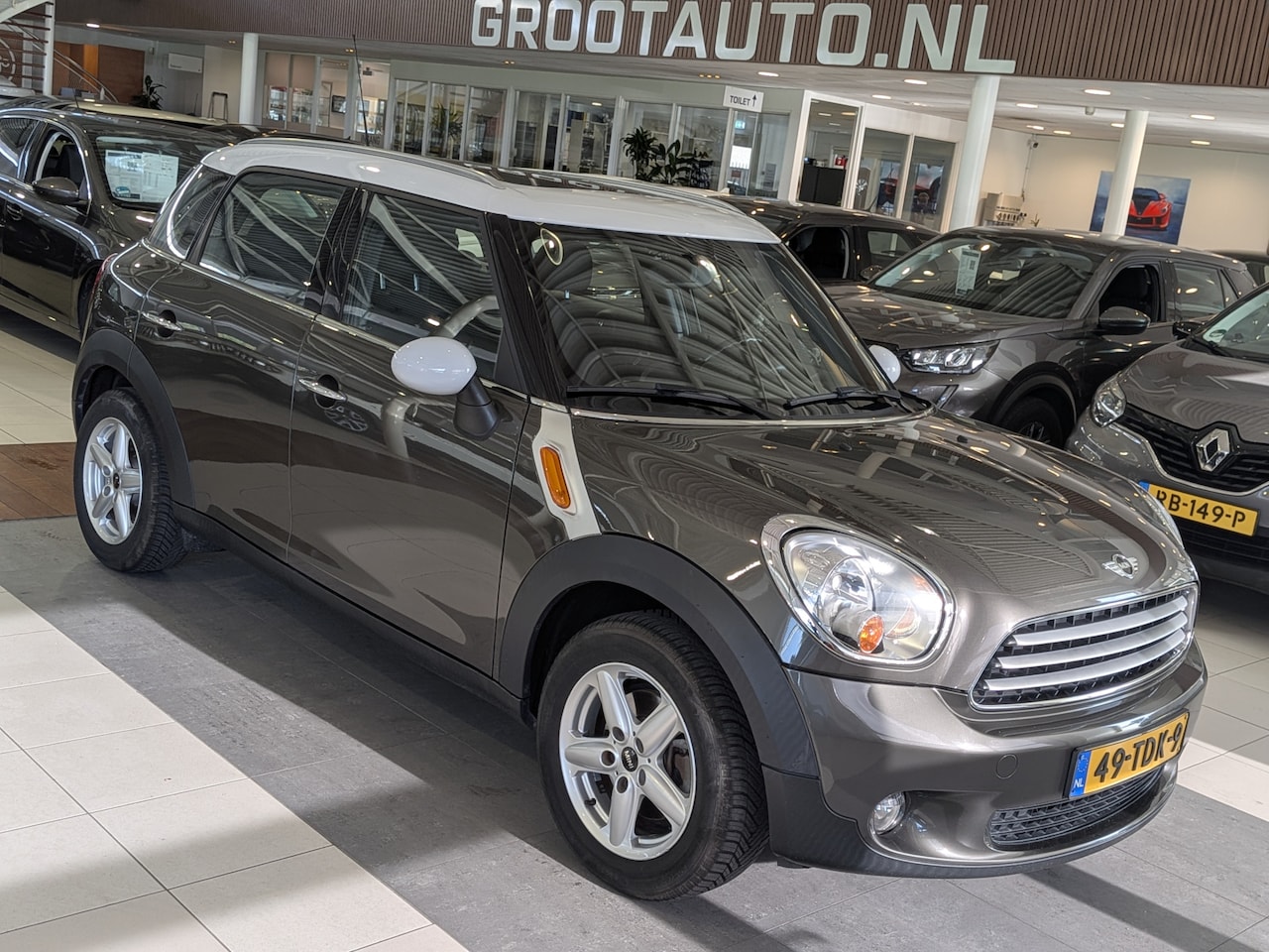 MINI Countryman - 1.6 Cooper Panoramadak, Airco, Cruise Control, Stuurbekrachtiging - AutoWereld.nl