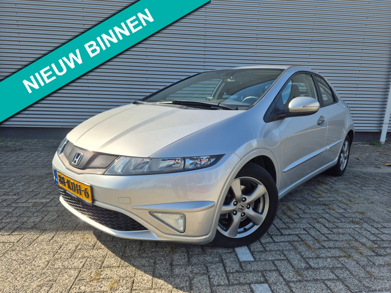 Honda Civic - 1.4 Sport 1.4 Sport,NIEUWSTAAT,Lage kilometerstand/1e eigenaar,Clima,Navigatie,LM-velgen - AutoWereld.nl