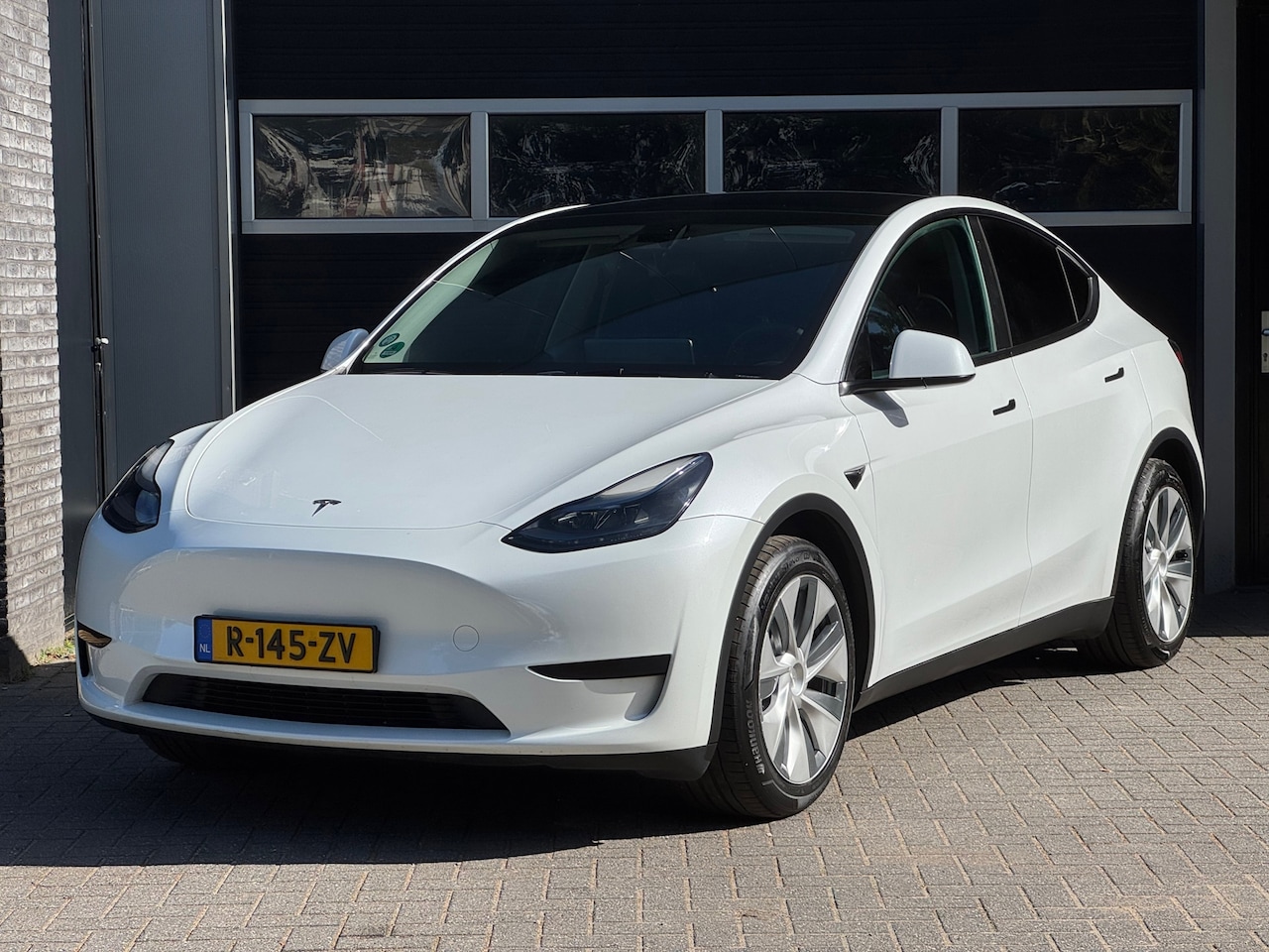 Tesla Model Y - RWD 58 kWh Pano, Auto Pilot, Camera, 4x Stoelverwarming, NAP - AutoWereld.nl
