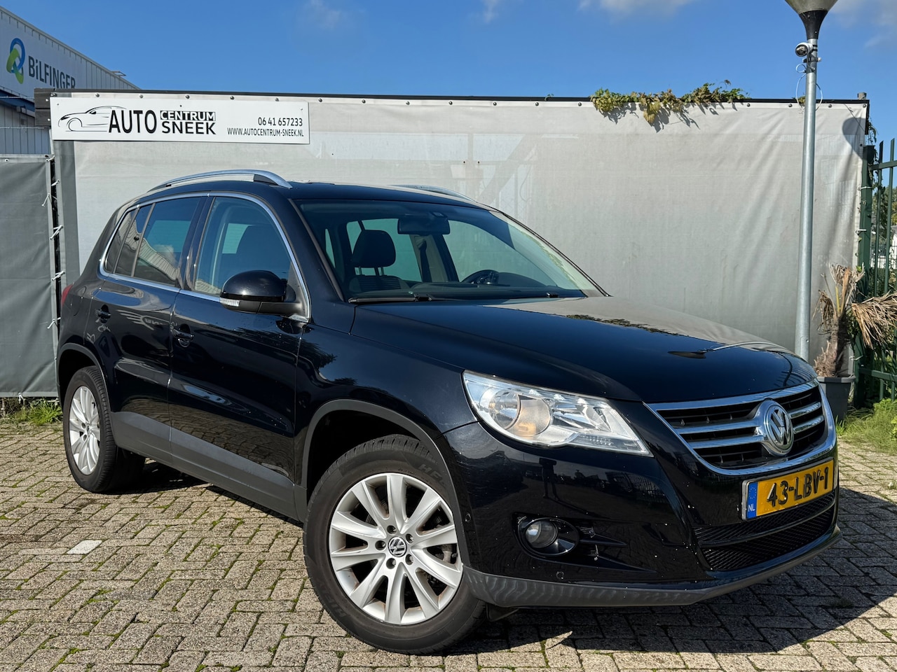Volkswagen Tiguan - 1.4 TSI Sport&Style-Clima-Cruise-Pano-PDC - AutoWereld.nl