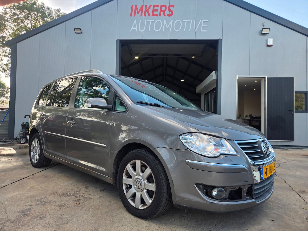 Volkswagen Touran - 2.0 TDI Highline AUT - AutoWereld.nl
