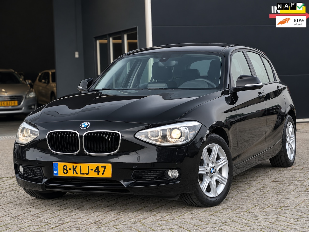 BMW 1-serie - 116d Executive AUTOMAAT NAVI/PDC/CRUISE - AutoWereld.nl