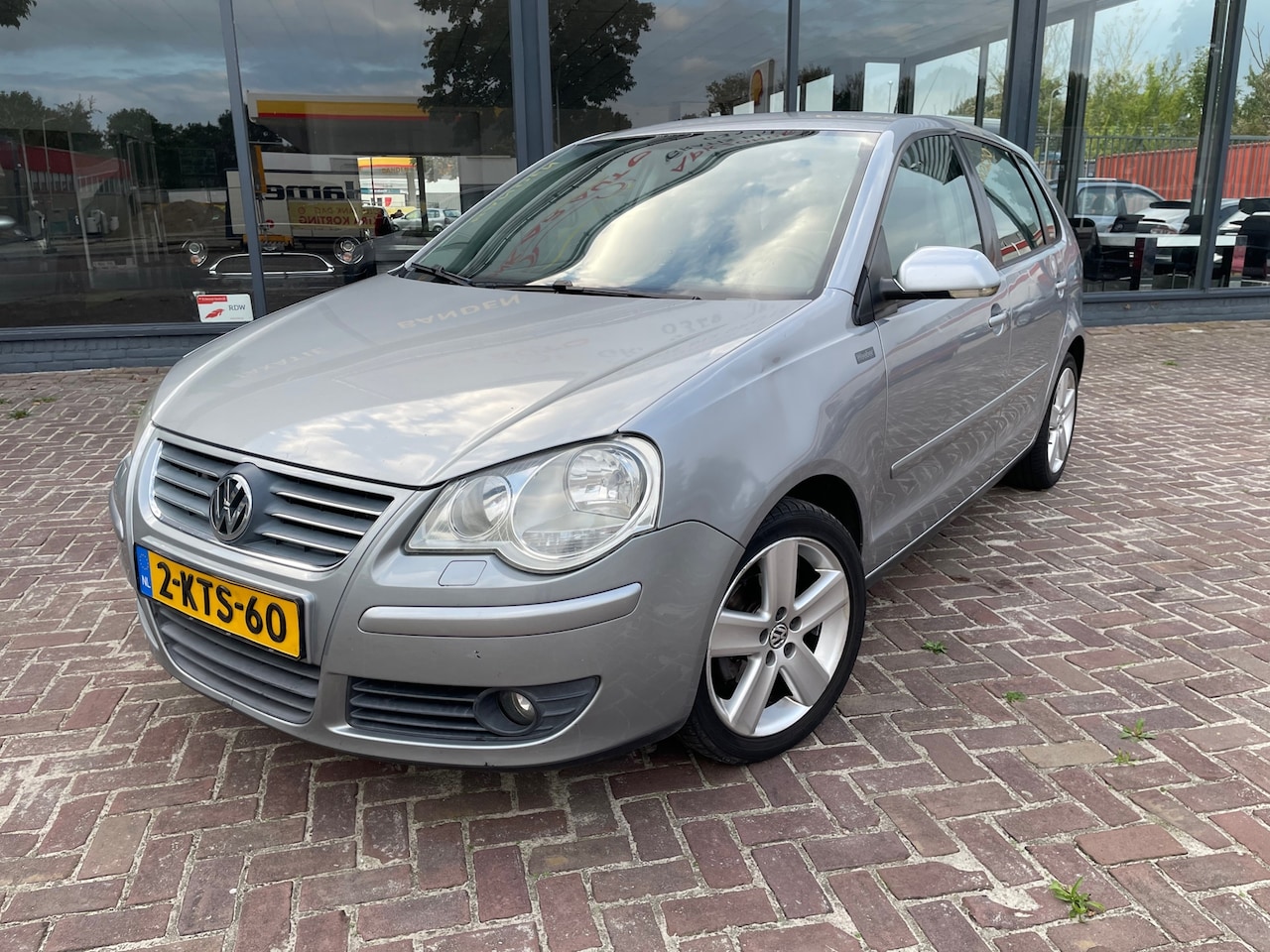 Volkswagen Polo - 1.4-16V Sportline Airco|Stoelverwarming|Leer|Climate|5DRS - AutoWereld.nl