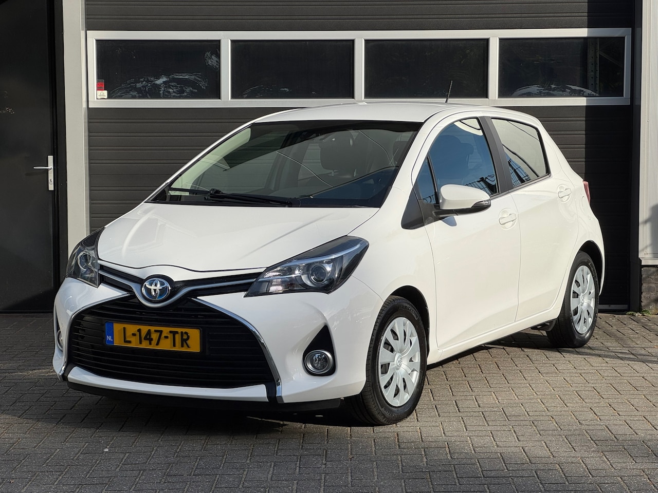 Toyota Yaris - 1.5 Hybrid Aspiration Navi, Camera, Cruise, Climate Control - AutoWereld.nl