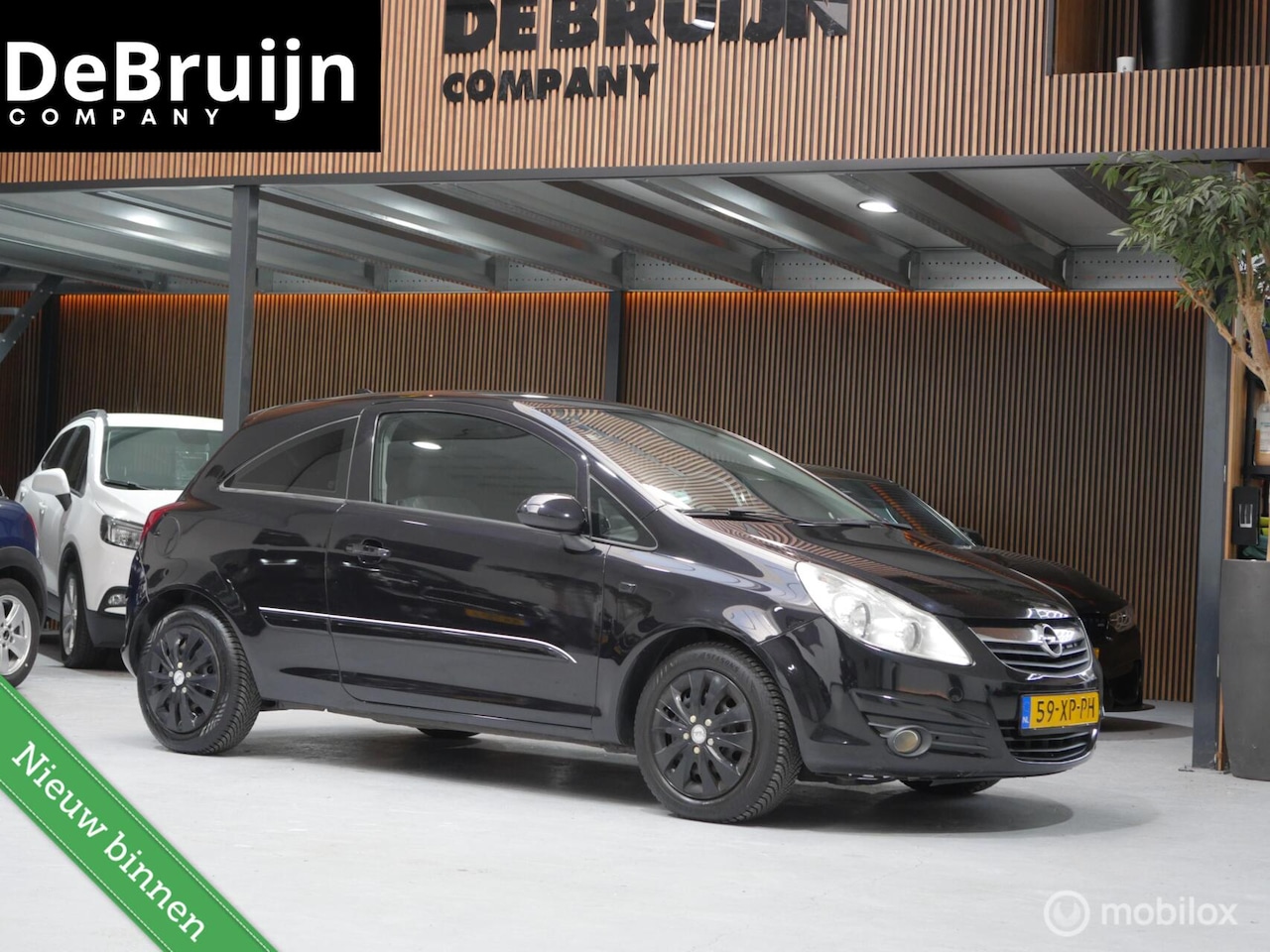 Opel Corsa - 1.4-16V Enjoy | Airco | Navi| APK | Garantie - AutoWereld.nl