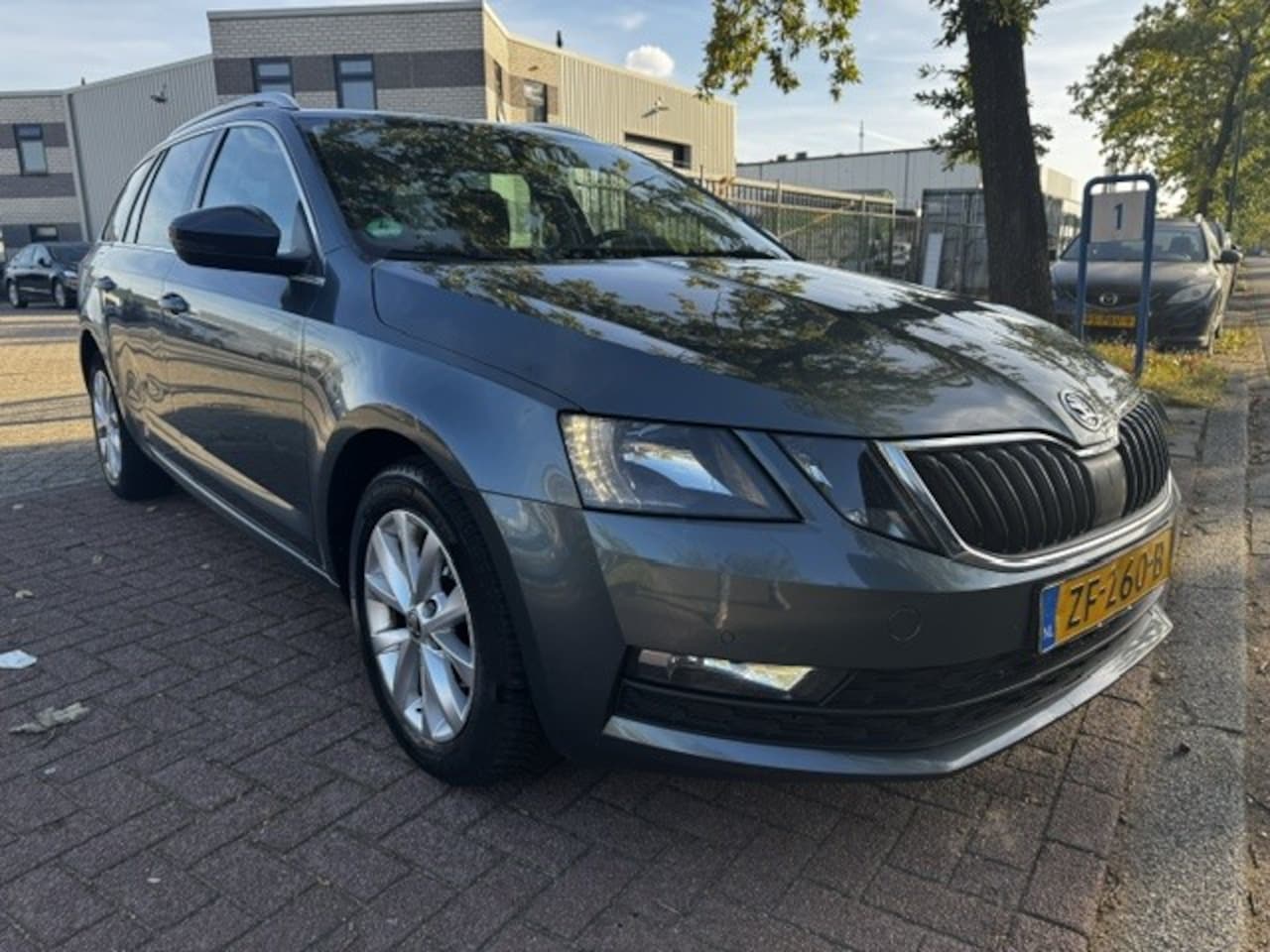 Skoda Octavia Combi - 1.6 TDI Greentech Ambition Automaat Airco/ECC,Navigatie EXPORT PRIJS - AutoWereld.nl