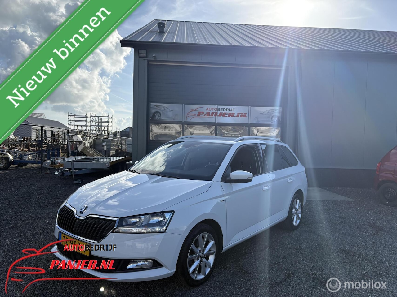 Skoda Fabia Combi - 1.0 TSI Style "AIRCO+CRUISE+NAVI+TREKHAAK" - AutoWereld.nl