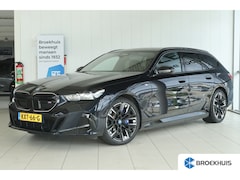 BMW i5 Touring - M60 xDrive 84 kWh 601PK | SOH 97% | 4-Wielsturing | Harman & Kardon | Trekhaak | Stoelverw