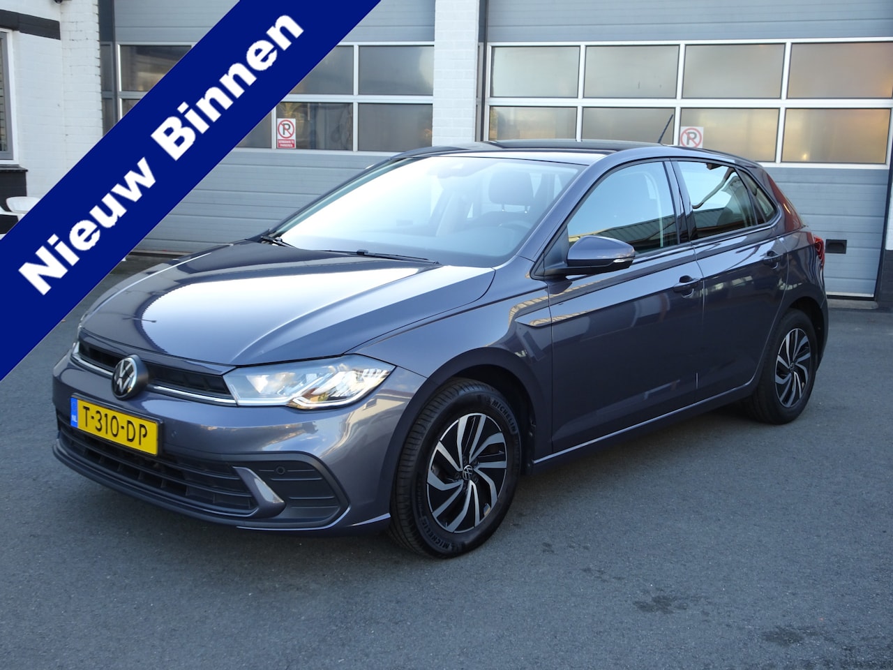 Volkswagen Polo - 1.0 TSI Life Business Automatische airco, cruise controle, navigatie, parkeersensoren voor - AutoWereld.nl