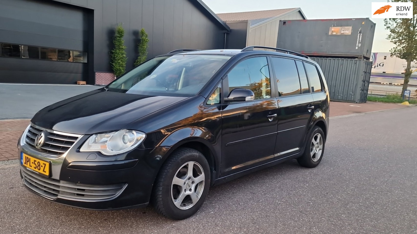 Volkswagen Touran - 1.4 TSI Business 7 PERS CARPLAY NAVI PSENSOR CRUISE - AutoWereld.nl