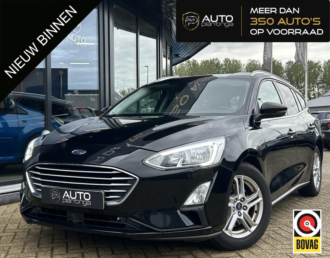 Ford Focus Wagon - 1.0 EcoBoost Titanium Business 125PK | AUTOMAAT | Parkeersensoren voor en achter | Navigat - AutoWereld.nl