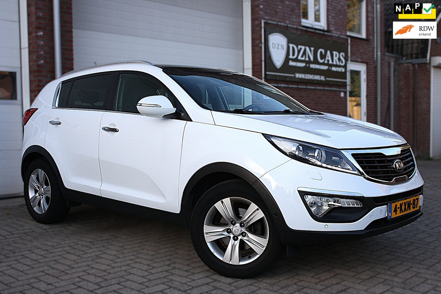 Kia Sportage - 1.6 GDI Super Pack Pano|Camera|Leer|Navi|Led|Parkeer hulp - AutoWereld.nl