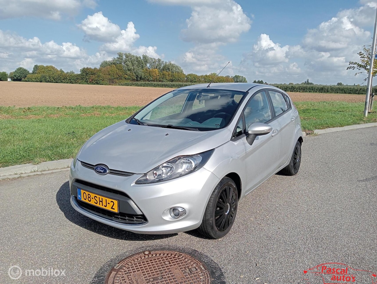 Ford Fiesta - 1.25 Limited nap airco - AutoWereld.nl