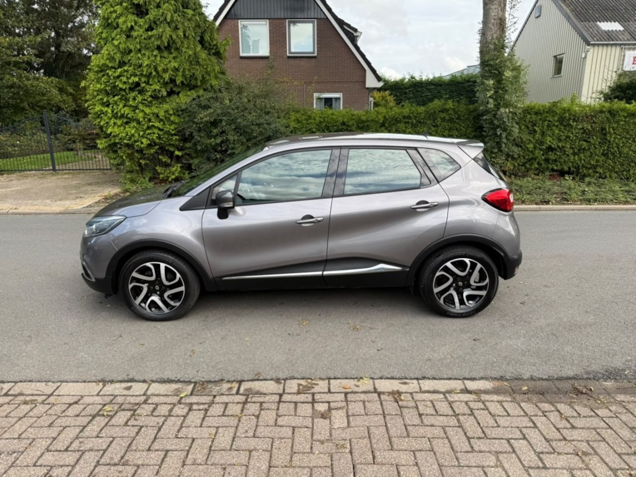 Renault Captur - 1.2 TCE Dynamique/ECC/Climate/cruise/automaat/Navigatie - AutoWereld.nl