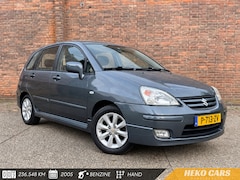 Suzuki Liana - 1.6 Exclusive·Carplay/Android·Stoelverw.·Airco·LM velgen