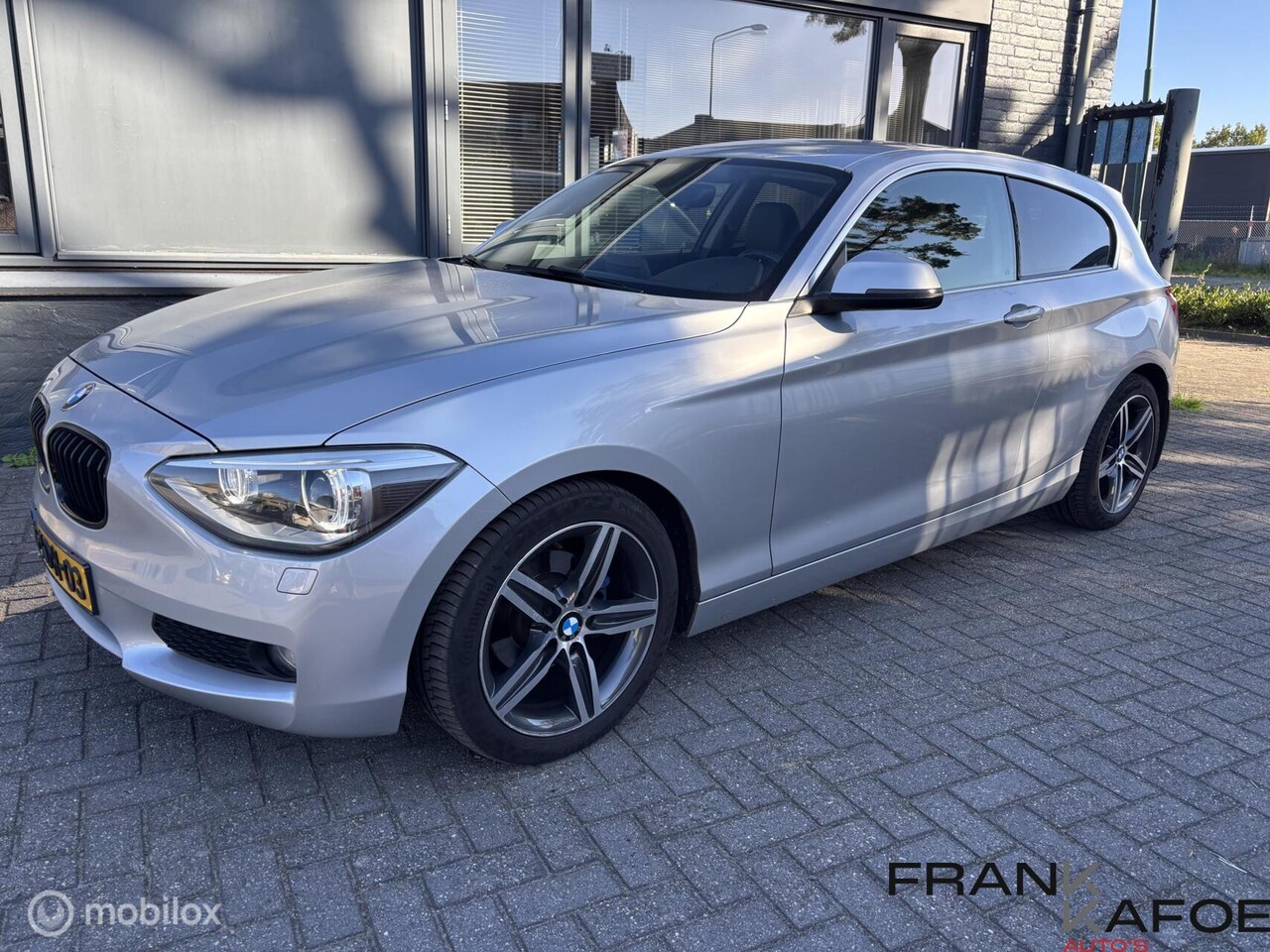 BMW 1-serie - 1.6i Upgrade Edition Airco Navi Bl.tooth Leder 17"LM Xenon PDC - AutoWereld.nl