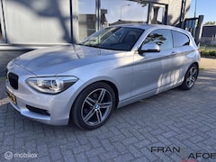BMW 1-serie - 1.6i Upgrade Edition Airco Navi Bl.tooth Leder 17"LM Xenon PDC