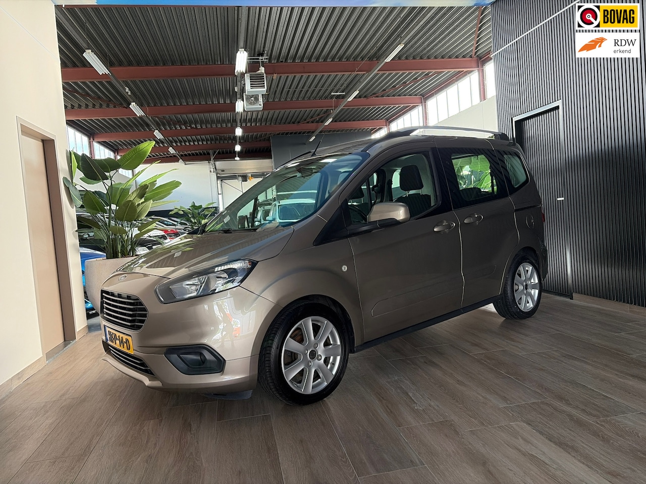 Ford Tourneo Courier - 1.0 Titanium/ Nieuwe motor en koppeling. hele mooie auto. - AutoWereld.nl