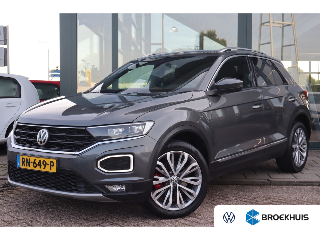 Volkswagen T-Roc - 1.5 TSI Sport 150PK | Bandenspanningscontrolesysteem | Cruise control adaptief | Regensens - AutoWereld.nl
