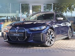 BMW i4 - (g26) M50 544pk M-Sport SoH 94% | Tansanietblau | Pano | 360 CAM | Laser | Harman/Kardon |