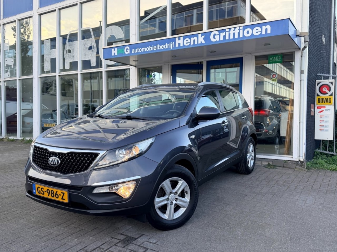Kia Sportage - 1.6 Dynamic I Airco I Camera I Trekhaak I Climate contr. - AutoWereld.nl