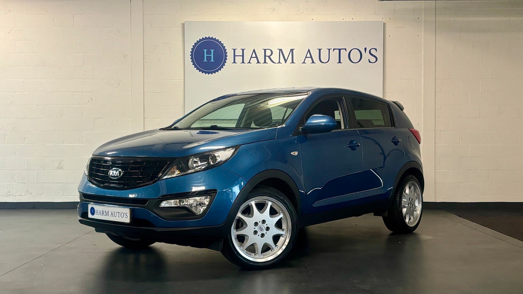Kia Sportage - 1.6 GDI EconomyLine Navi / Trekhaak / CAM / Cruise - AutoWereld.nl