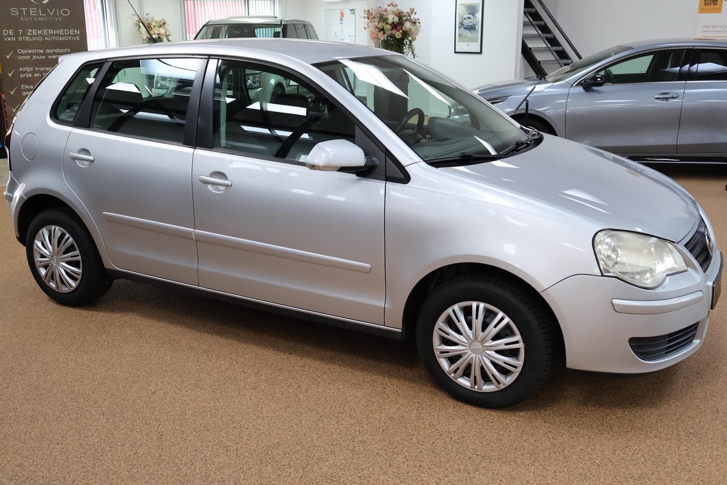 Volkswagen Polo - 1.2 Optive | 5-deurs | 118.323 km | Airco | Apple CarPlay - AutoWereld.nl