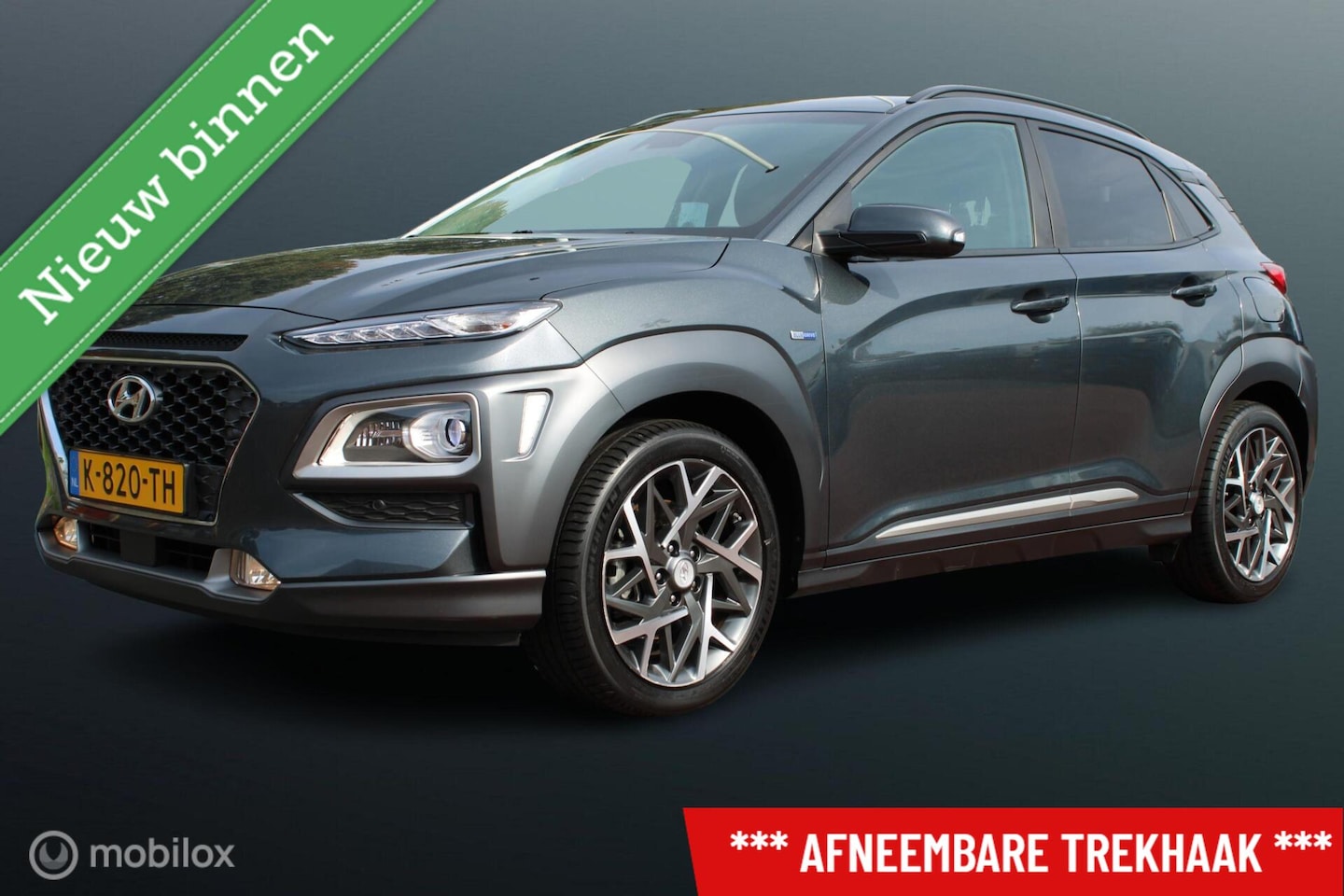 Hyundai Kona - 1.6 GDI HEV Premium 1.6 GDI HEV Premium, Stoel-stuurverwarming + koeling, Trekhaak, Donker glas, Navi, App con - AutoWereld.nl