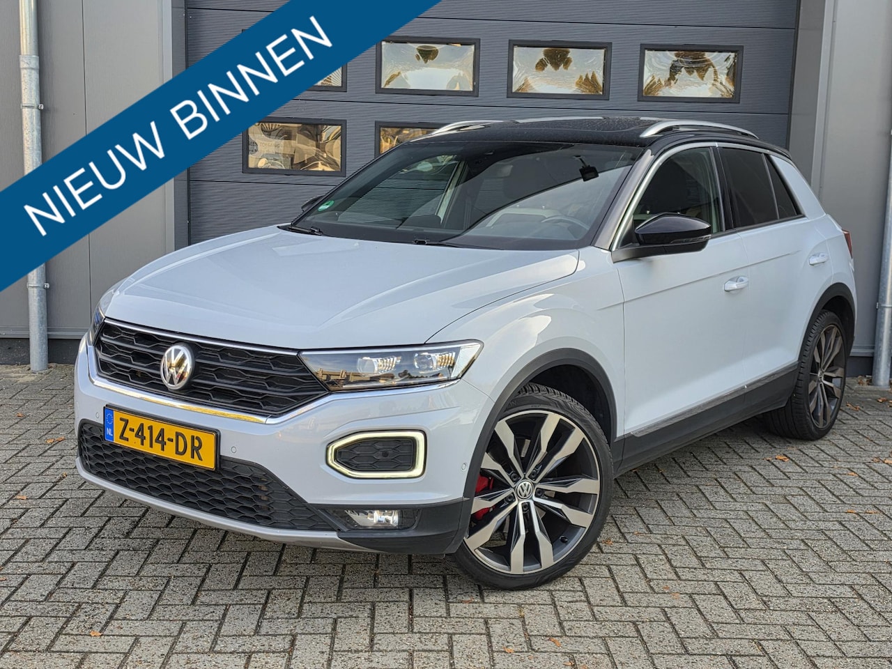 Volkswagen T-Roc - 2.0 TSI 4Motion Sport PANO - TREKHAAK - AutoWereld.nl
